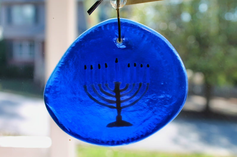 Silber Menorah on blue glass suncatcher