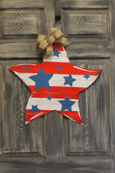 Stars and Stripes forever with this patriotic red, white, and blue Door Hanger. From Harvest Array.