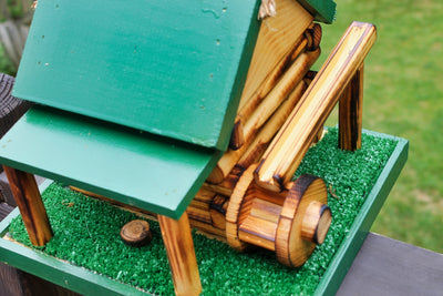 Close up of the front and water wheel of the Grist Mill Birdhouse for Harvest Array