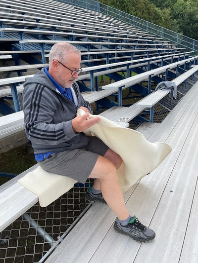 The Warmer Upper Lap Throw is great for the high school football game