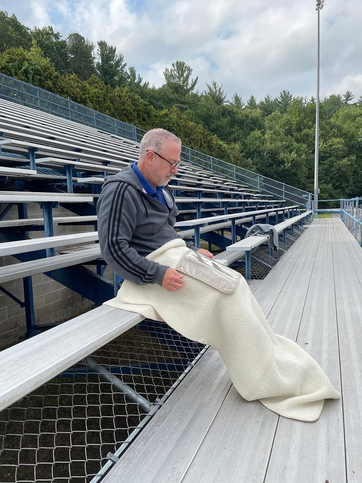 The Warmer Upper Lap Throw is ready for the football game