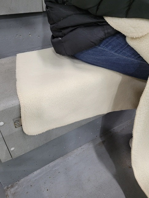 The Warmer Upper Lap Throw as a seat cushion