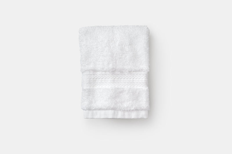 American Blossom 100% Organic Cotton Washcloth has a decorative dobby design for a classic look.