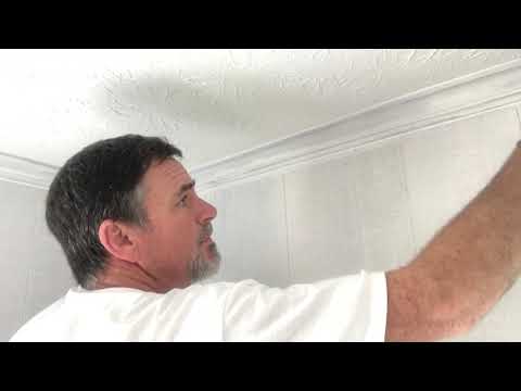 Caulking crown molding to a stippled ceiling