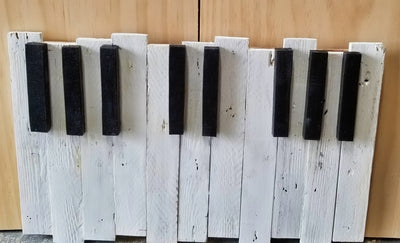 Handcrafted Piano Keyboard Wall Art is made of recycled wood.  This would be a great addition to a piano room or music lovers bedroom. 