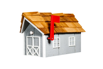 Light gray and white wooden mailbox with cedar roof