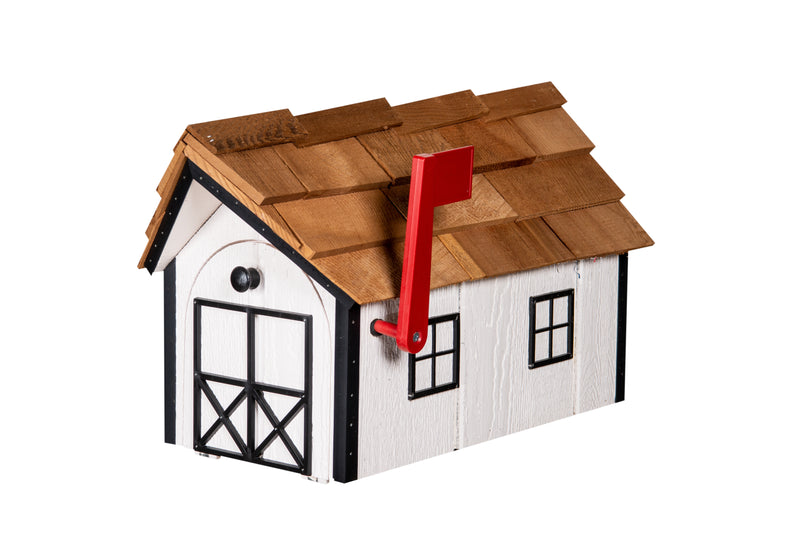 White and black wooden mailbox with cedar shakes